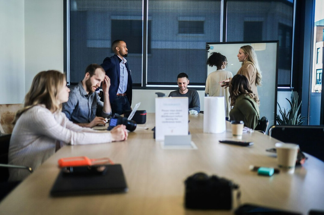 business people negotiating in office
