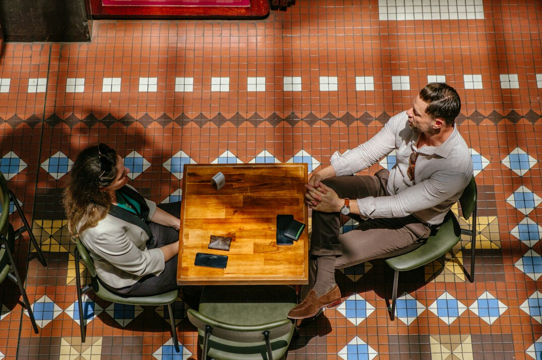 confident businessman at negotiation table